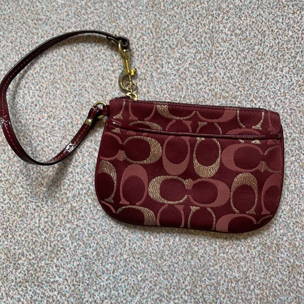 Used burgundy change purse